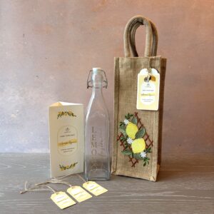 Lemon Liqueur Gift Kit with embellished jute bottle bag, glass bottle, recipe booklet and bottle labels