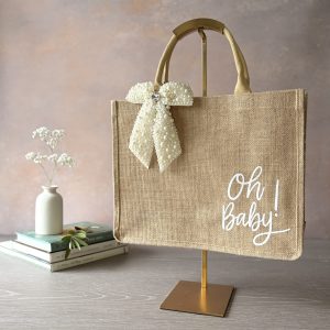 Large jute baby gift bag with white Oh Baby lettering and pearl bow