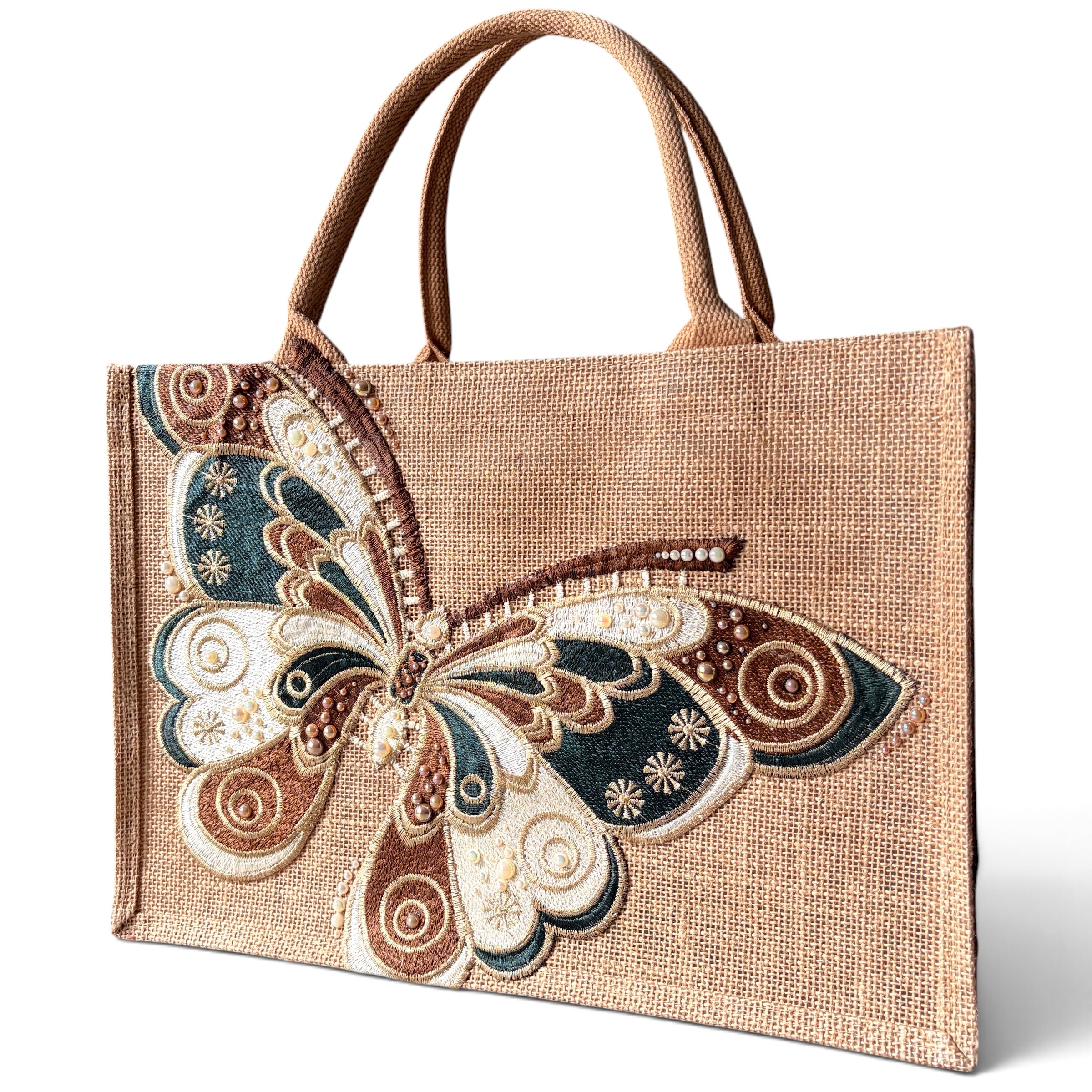 Front view of Sylvan butterfly jute bag with oversized embroidered butterfly in green, brown, cream and gold.